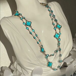 Elegant Gold Necklace with Blue Accents